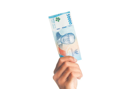 Hand Holding Indonesian Rupiah IDR 50000 Banknotes Isolated on White Background.Hand Holding Indonesian Rupiah IDR 50000 Banknotes Isolated on White Background.