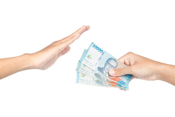 Close-up of a hand refusing money - anti bribery and corruption concepts,Business corruption...