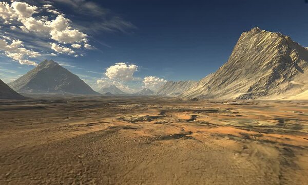Arid landscape Rock formations meet the sky beneath scattered clouds, creating a sense of vastness and adventure