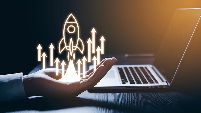 Startup business concept, Businessman use laptop with virtual screen of rocket icon and up arrow for fast start up business. Strategic planning and business success.