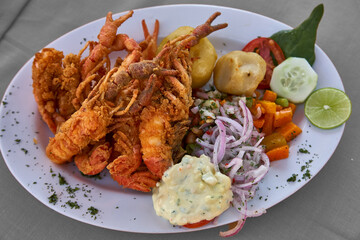 Peruvian Camarones Fritos, or fried shrimp, is a delicious and popular dish that features crispy and flavorful shrimp. Peruvian cuisine is known for its vibrant and diverse flavors.