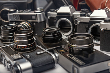 Collection of vintage film cameras showcasing a rich history of photography technology and...