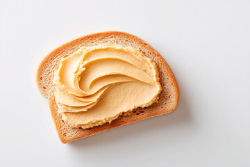 Slice of bread with smooth hummus spread on white background, minimal and appetizing presentation