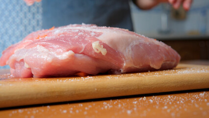 Preparing fresh pork for a delicious meal at home