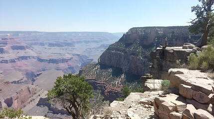 Grand canyon vista with rocky cliffs and distant layered landscape under a clear blue sky view point .