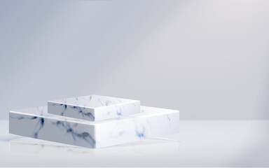 Two white marble rectangular pedestals of different sizes are stacked against a soft, light gray background. The luxurious stone features subtle blue-gray veining, creating an elegant display.