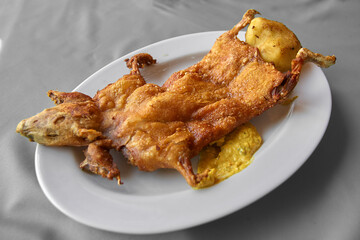 A true taste of tradition in Cusco.Roasted guinea pig, or 'cuy,' is more than just a dish—it's a culinary experience steeped in history. Savored for generations.