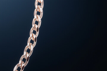 Gold chain bracelet with braided design, representing elegance, luxury, and craftsmanship. Fashion and lux jewelry and accessories.