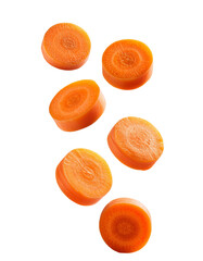 Fresh carrot slices falling on transparent background