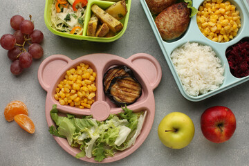 Healthy diet. Different meals in containers and products on Grey background, flat lay. Diet and calorie counting Space for text