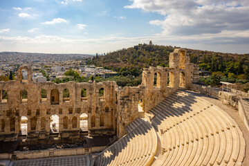 The Roman theater of Odeon of Herodes Atticus in the foreground and the Filopappou Hill in the...