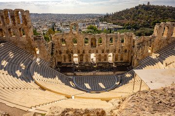 The Roman theater of Odeon of Herodes Atticus in the foreground and the Filopappou Hill in the background
