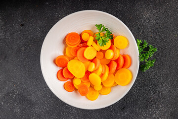 Carrot rings boiled vegetable vegetable dish fresh delicious gourmet food background on the table rustic food top view copy space keto and paleo diet vegetarian and vegan food
