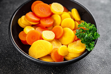 Carrot rings boiled vegetable vegetable dish fresh delicious gourmet food background on the table rustic food top view copy space keto and paleo diet vegetarian and vegan food