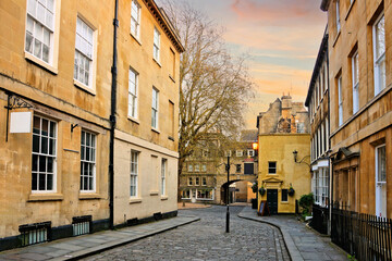 Cobblestone streets of the Georgian Old Town of Bath at sunset, Somerset, England, UK