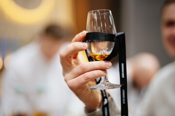 Celebrating fine spirits at a distillery tour in an elegant tasting room