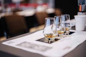 Whisky tasting experience with elegant glasses and notes on the table