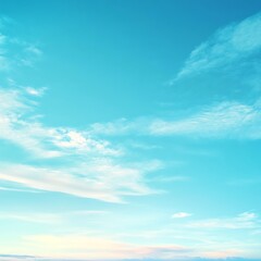 Tranquil sky with soft clouds and gradient blue hues