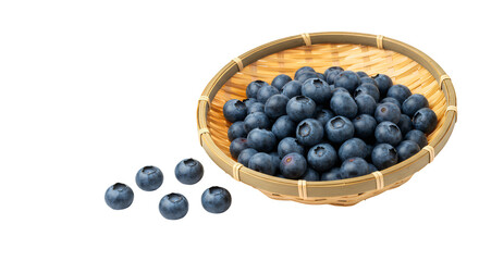 A wooden bowl overflowing with plump, dark blue blueberries, some spilled over the sides.
