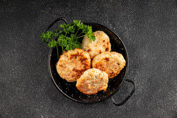 Meat cutlets pork, beef, chicken, lamb fried meat dish fresh delicious gourmet food background on the table rustic food top view copy space