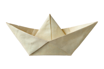 A delicate origami sailboat, crafted from creamy textured paper with subtle orange lines, ready to embark on an imaginative journey.