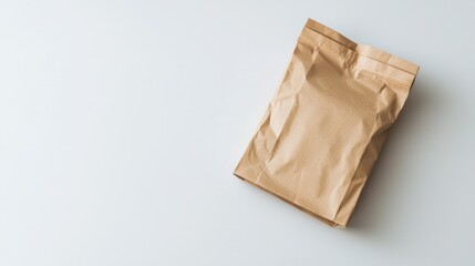 Fototapeta premium Delivering products in an unmarked brown paper bag for eco-friendly packaging solutions at a home setting