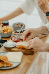 A couple having breakfast in the kitchen