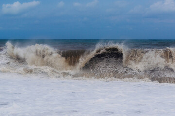 Stormy sea waves breaking near the coast