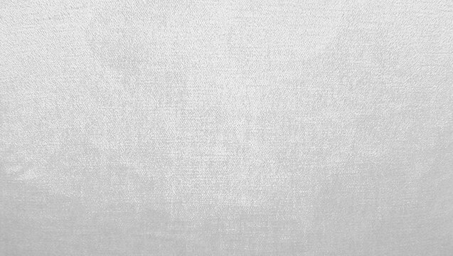 A close-up photograph showcasing the rich, vibrant texture of white velvet fabric with a subtle gradient, suitable for use as a luxurious background or design element. - Powered by Adobe