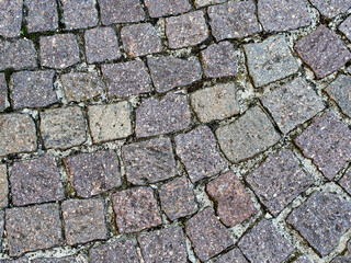Close-up of paving stone. Cobblestone background