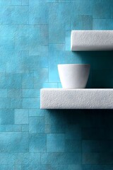 Minimalist display of a bowl on textured blue wall shelves