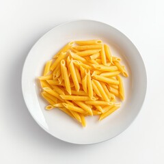 Overhead shot of penne pasta on a white plate against a white background