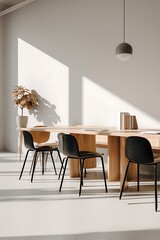 A modern and minimalist office space with a large wooden table and black chairs.