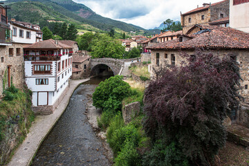 Typical medieval architecture of Cantabria in Spain in the town of Potes, picturesque old houses
