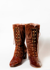 pair of brown leather boots