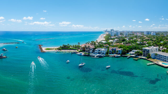 drone view of Hillsboro Inlet, Florida with beach and city