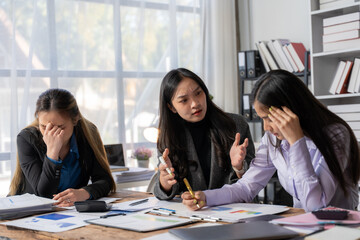 Frustrated Businesswomen Discussing Problems in Office