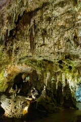 Exploring beautiful Postojna cave in Slovenia the most visited european cave.  Thousands of...