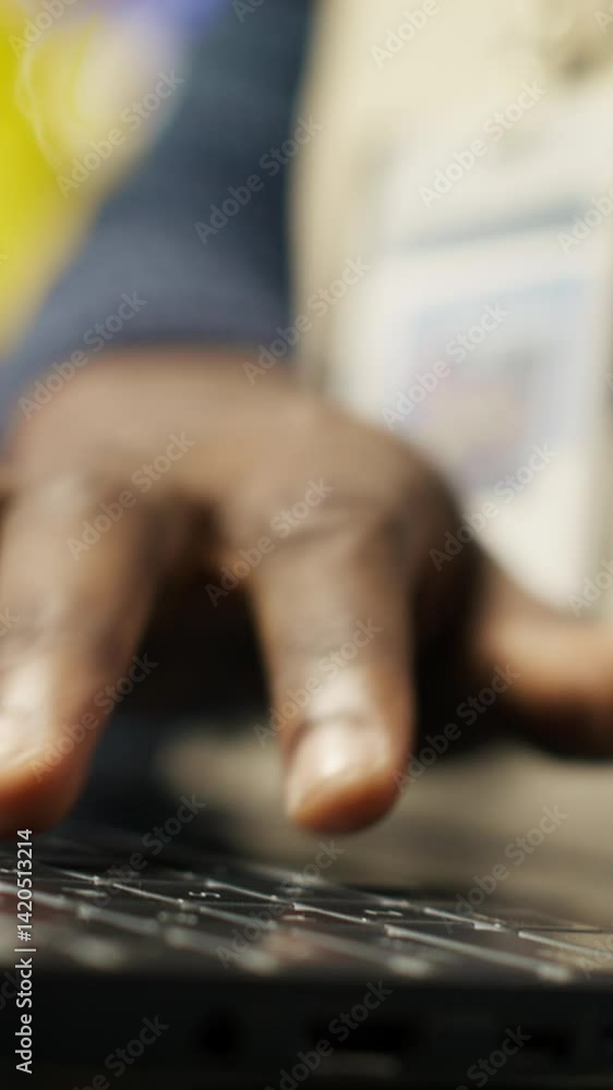 Aufkleber vertical video close up of smart factory worker using laptop to test automated systems, monitoring p