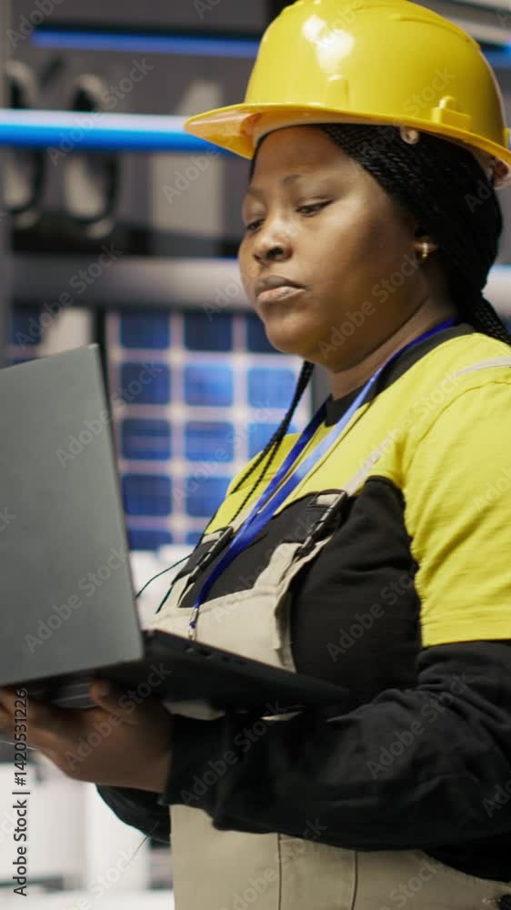 Aufkleber vertical video engineer walking in smart factory, using laptop to analyze iot sensors data, refining