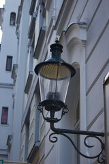 Vintage street lamp on historic building