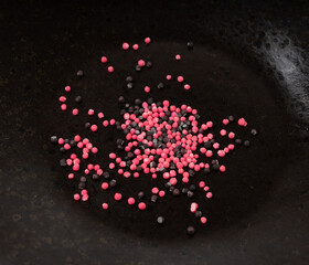 Candy sprinkle pile, round sugar sprinkles, small sweet color confectionery decoration balls