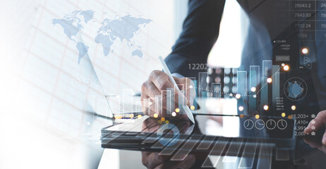 Business, finance and investment concept. Businessman using digital tablet analyzing business...