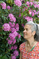 Mature woman Rhododendron flowers