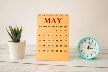 19 May text on wooden blocks with customizable space for text or messages.