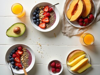 A top-down view of a beautifully arranged breakfast table featuring a variety of colorful healthy foods.