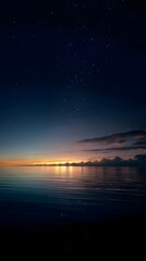 Fototapeta premium Starry sky above calm dark water distant emot