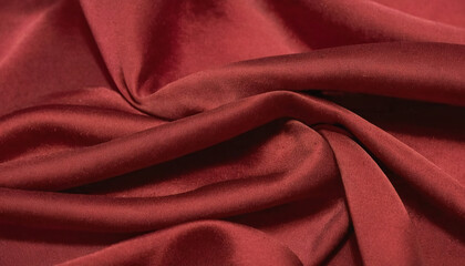 Obraz premium This luxurious deep red fabric drapes beautifully, its soft texture inviting touch and adding warmth to any environment. Perfect for creating stunning fashion or decor pieces Generative AI
