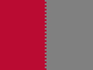 An abstract background with a bi-color design.  A crimson red section is separated from a gray section by a gray, jagged, vertical line.