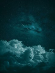Obraz premium Stunning night sky with shooting star over teal clouds. Perfect for backgrounds, wallpapers, and dreamy designs.